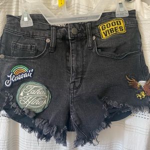 Super cute black cutoff shorts with patches